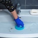 Drain being de-clogged