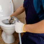 drain cleaning a bathroom drain