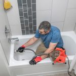 drain cleaning a pipe