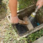 cleaning a grease trap