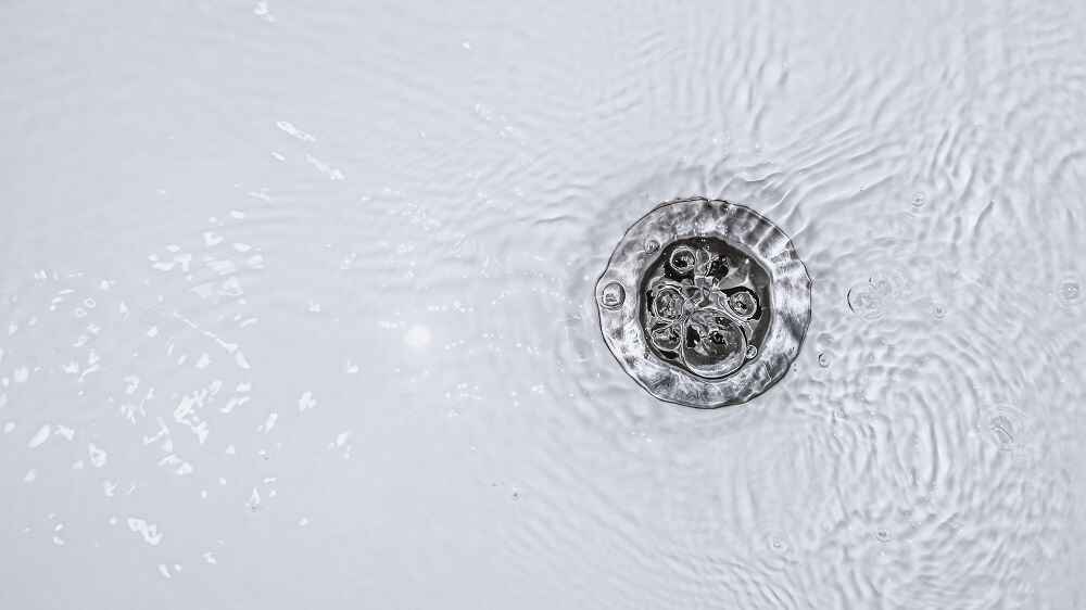 Water flowing down the drain