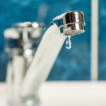 water dripping from an open faucet