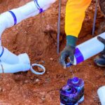 EJ Home Services technician working on a sewer repair project