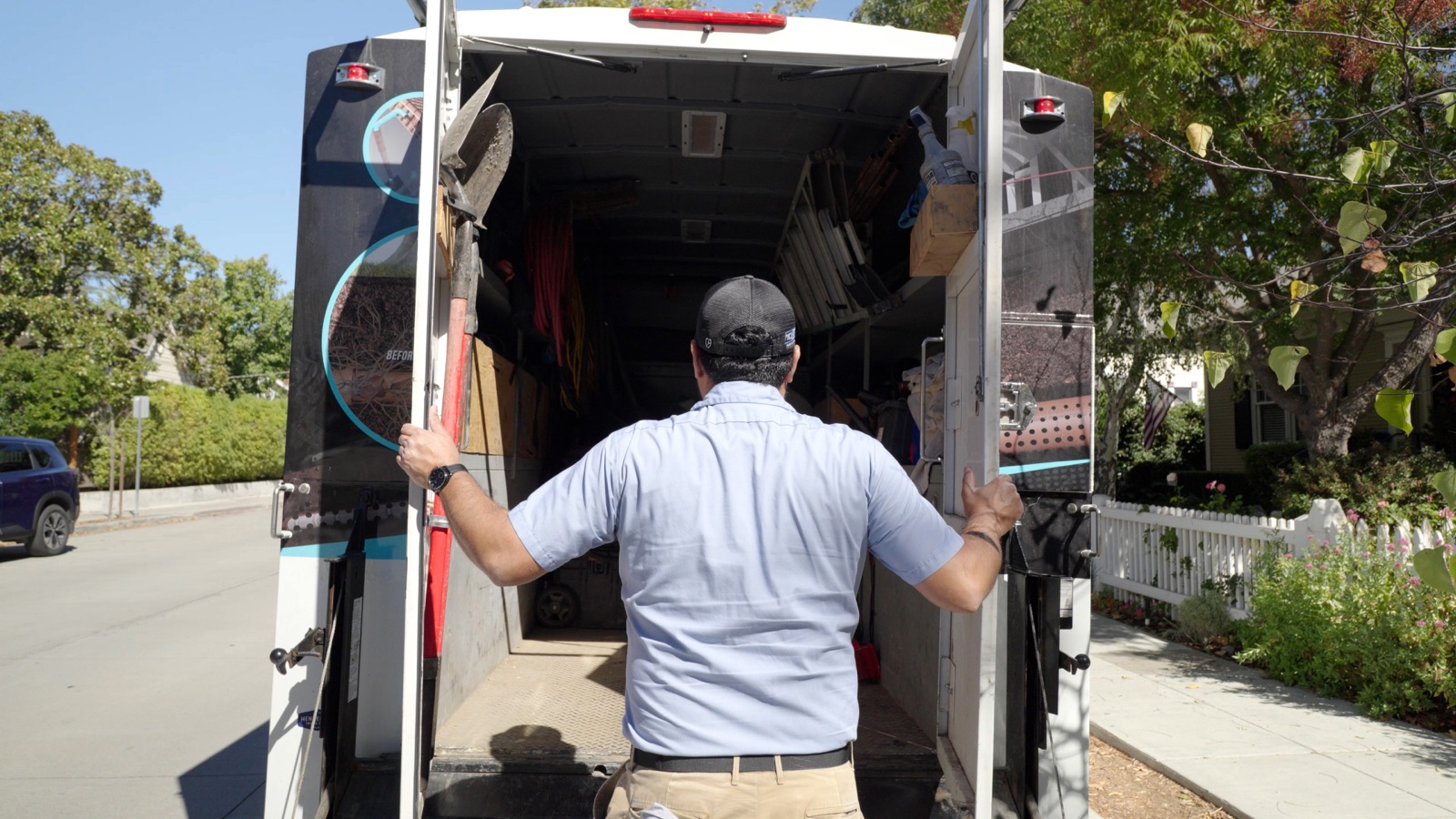 EJ drain technician preparing a fully stocked service truck